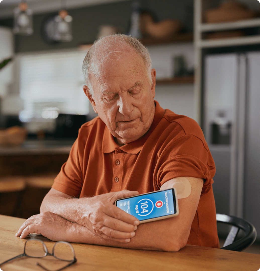 Man checking blood sugar on smartphone